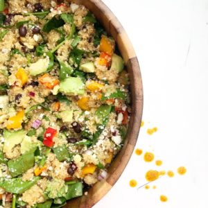 quinoa salad in a brown bowl