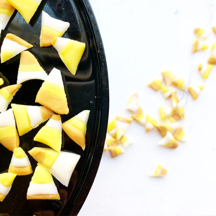 homemade candy corn on a black plate