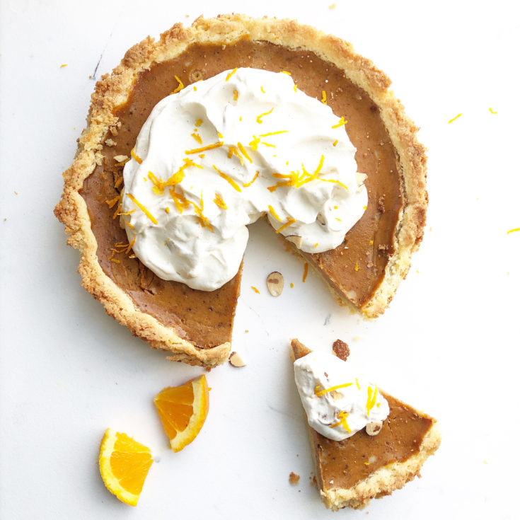 Orange Maple Pumpkin Pie on a white background