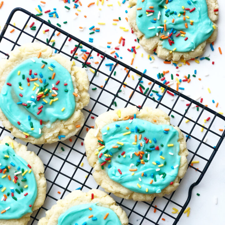 frosted sugar cookies with sprinkles