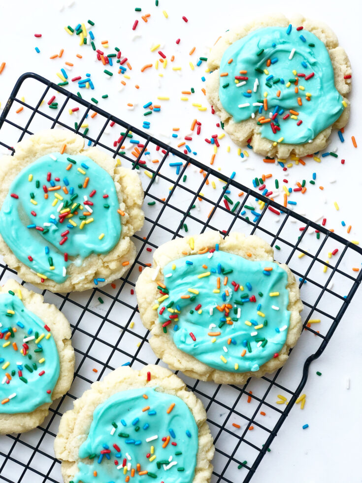 frosted sugar cookies with sprinkles