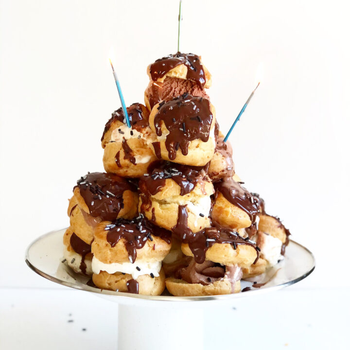 profiteroles with pate a choux tower with ice cream and ganache