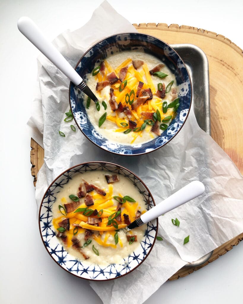 loaded potato soup with spoons